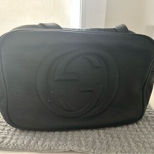 Gucci Black Leather Crossbody Bag with Embossed Logo